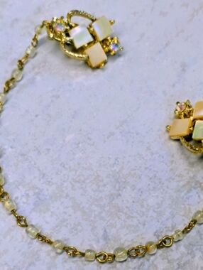 Vintage Goldtone Sweater Clip with Ornate Filigree Design